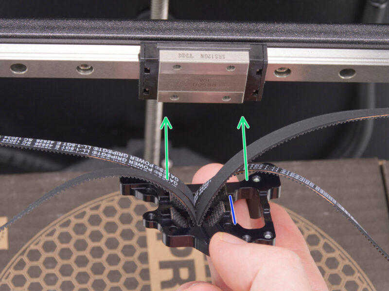 Belt ends clamped in the holder