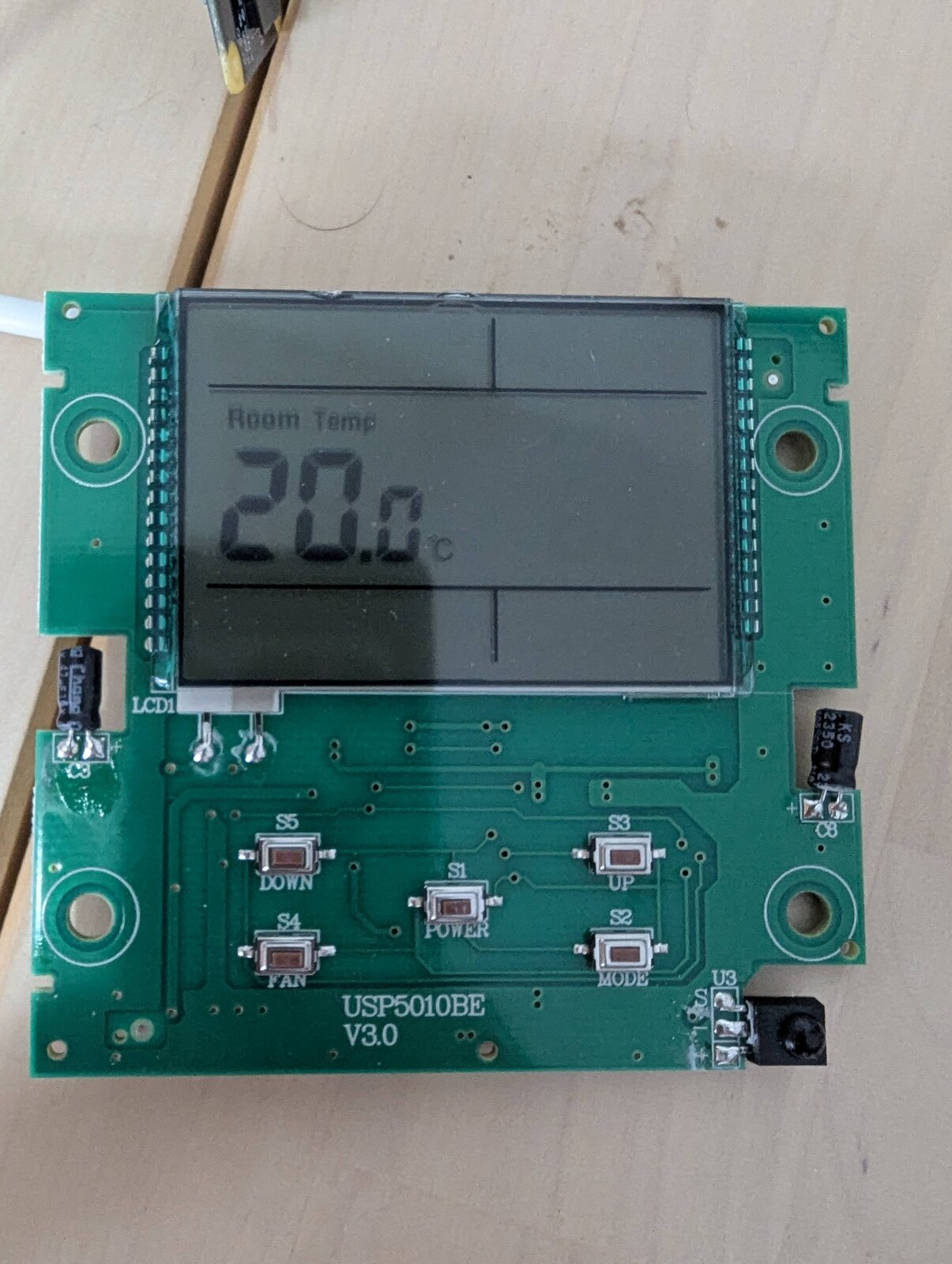 The spare panel, alive on the bench
