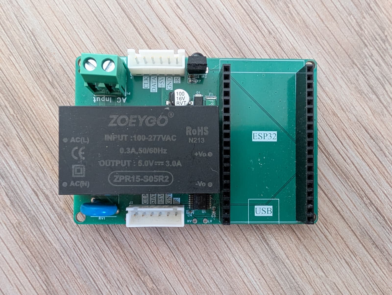 The v2 board - screw terminal in, IR LED out, TXS0104 aboard